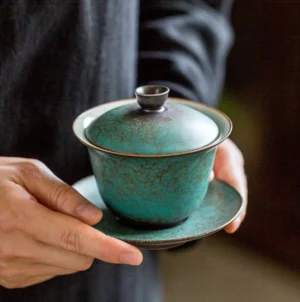 Handmade blue-green crackled ceramic gaiwan with lid and saucer, full product view