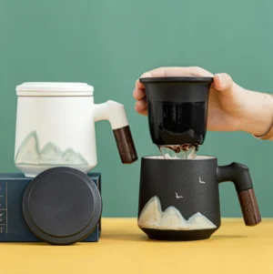 full set view of ceramic tea mug with infuser and lid showing wood handle and fine mesh infuser