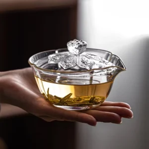 Full view of clear glass gaiwan teapot with lotus lid knob