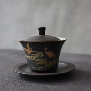 Full view of hand-painted black golden crane traditional Chinese ceramic gaiwan tea set