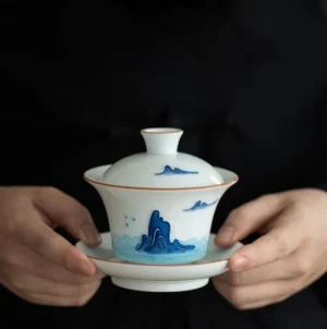Full front view of hand-painted blue mountain cloud ceramic gaiwan