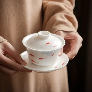 Hand-painted koi fish pattern white porcelain gaiwan three-piece tea set