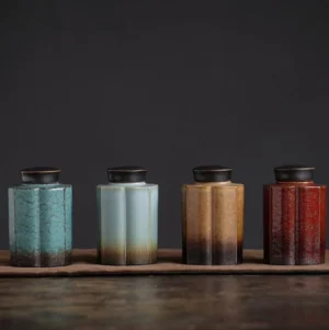 Side view of handcrafted ceramic sealed tea container with gradient glaze