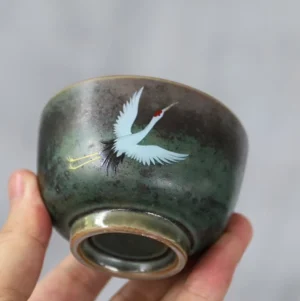 Vintage hand-painted crane Chinese ceramic tea cup side view